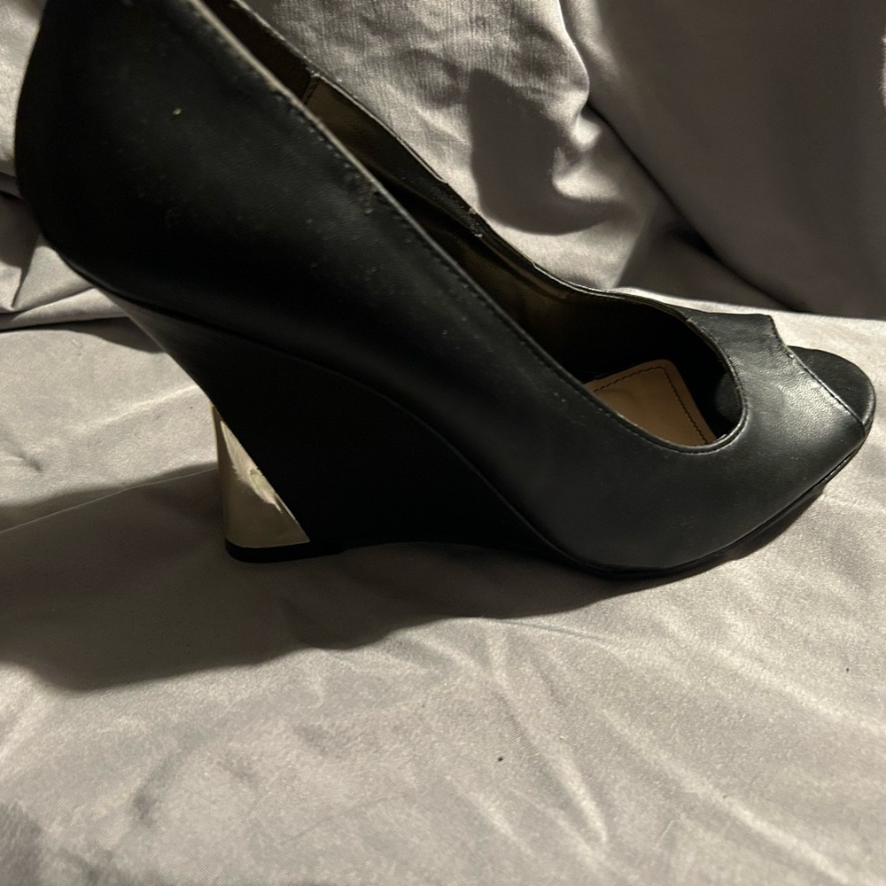 Black wedge with gold accents